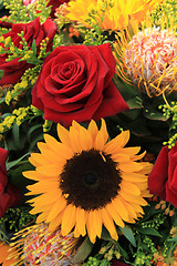 Image showing Sunflowers and roses