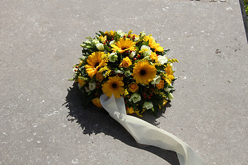 Image showing Yellow sympathy flowers