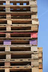 Image showing Stacked wooden pallets