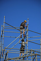 Image showing Construction worker on scaffolding