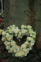 Image showing Heart shaped sympathy flowers