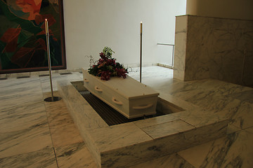 Image showing White casket with funeral flowers