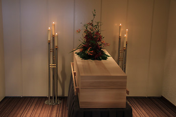 Image showing Wooden casket in funeral home