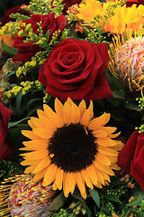 Image showing Sunflowers and roses