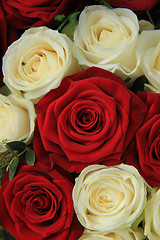 Image showing Red and white roses in a wedding arrangement