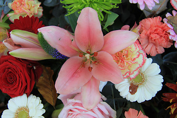 Image showing Lilies and roses in bridal flowers