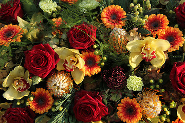 Image showing roses and orchids in a flower arrangement