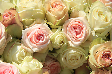 Image showing White and Pink roses in wedding arrangement