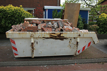 Image showing Loaded dumpster