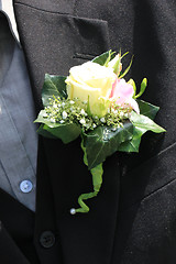 Image showing Groom wearing boutonniere