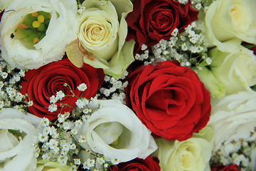 Image showing Red and white roses in a bridal bouquet