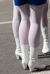 Image showing Woman\'s legs in white boots