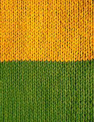 Image showing Stocking stitch knitting in yellow and green stripes