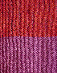 Image showing Red and purple striped stocking stitch knitting