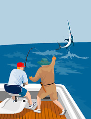 Image showing Fishermen hooking a blue marlin