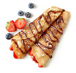 Image showing Crepes with strawberries and chocolate