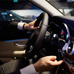 Image showing hands on a steering wheel