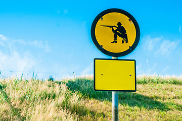 Image showing Shooting range sign in yellow