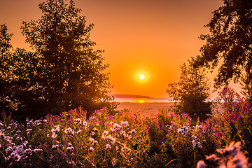 Image showing Sunrise over a lake in a countryside