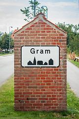 Image showing Gram city sign on a brick post