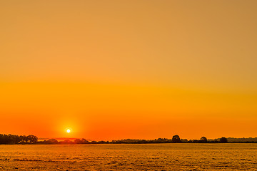 Image showing Countryside landscape with a beautiful sunrise