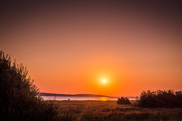 Image showing Countryside lake with a sunrise