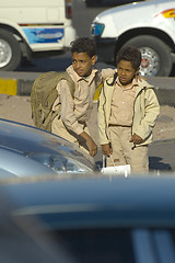 Image showing Boys come back home from school