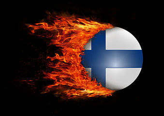 Image showing Flag with a trail of fire - Finland
