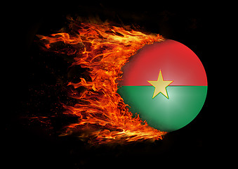 Image showing Flag with a trail of fire - Burkina Faso