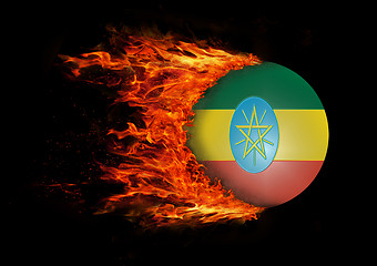 Image showing Flag with a trail of fire - Ethiopia