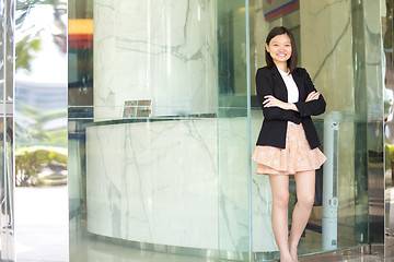 Image showing Young Asian female business executive smiling portrait