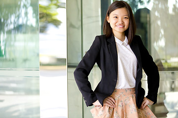 Image showing Young Asian female business executive smiling portrait