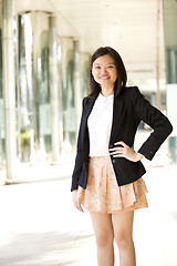 Image showing Young Asian female business executive smiling portrait