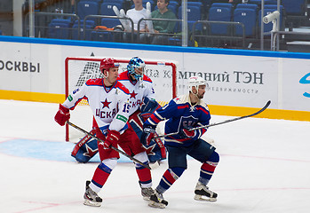 Image showing A. Koznev (9) and V. Brezgunov (15) in action