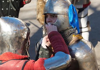 Image showing Putting on a helmet