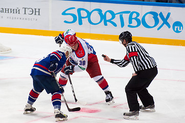 Image showing A. Koznev (9) and A. Nikolishin (38) on faceoff