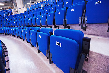 Image showing Numbered seats in row