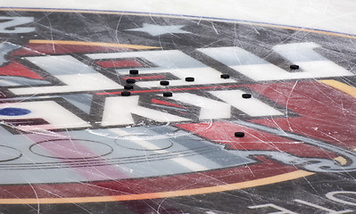 Image showing Pucks on the ice rink