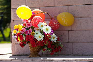 Image showing Flowers on the monument