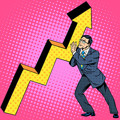 Image showing Businessman raises growth chart