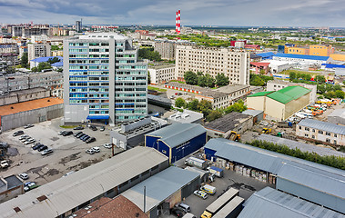 Image showing Aerial view of office building and urban quarters