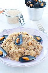 Image showing Warm quinoa salad with mussels, tomatoes and potatoes