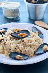 Image showing Warm quinoa salad with mussels, tomatoes and potatoes