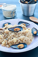 Image showing Warm quinoa salad with mussels, tomatoes and potatoes