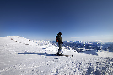 Image showing Skier on top of ski slope