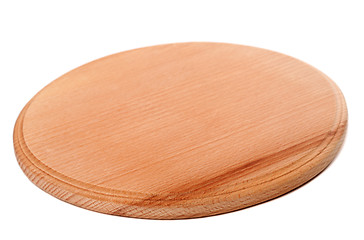 Image showing Round wooden kitchen board on white background