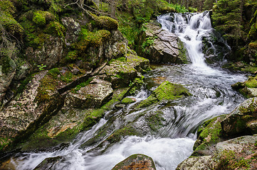 Image showing waterfall in deep forest at mountains