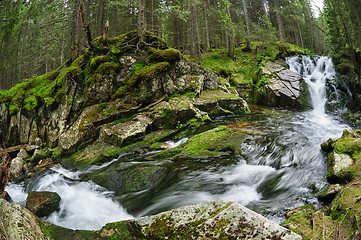 Image showing waterfall in deep forest at mountains