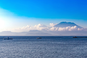 Image showing view on Bali from ocean, vulcano in clouds