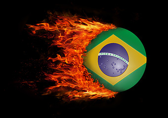 Image showing Flag with a trail of fire - Brazil